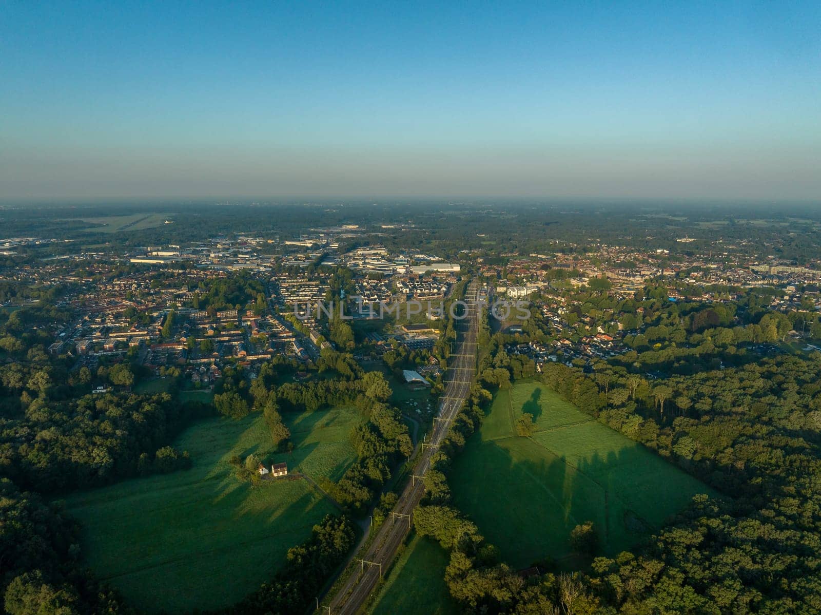 aerial view of the city of Oldenzaal in the eastern part of the netherlands. In the center the east west railroad