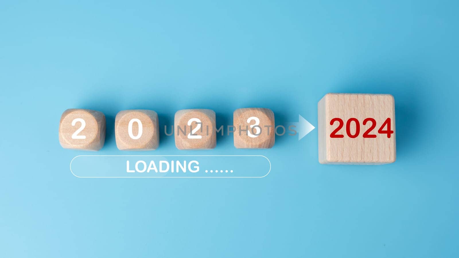 Wooden blocks lined up with the letters 2023. Represents the goal setting for 2024, the concept of a start. financial planning development strategy business goal setting