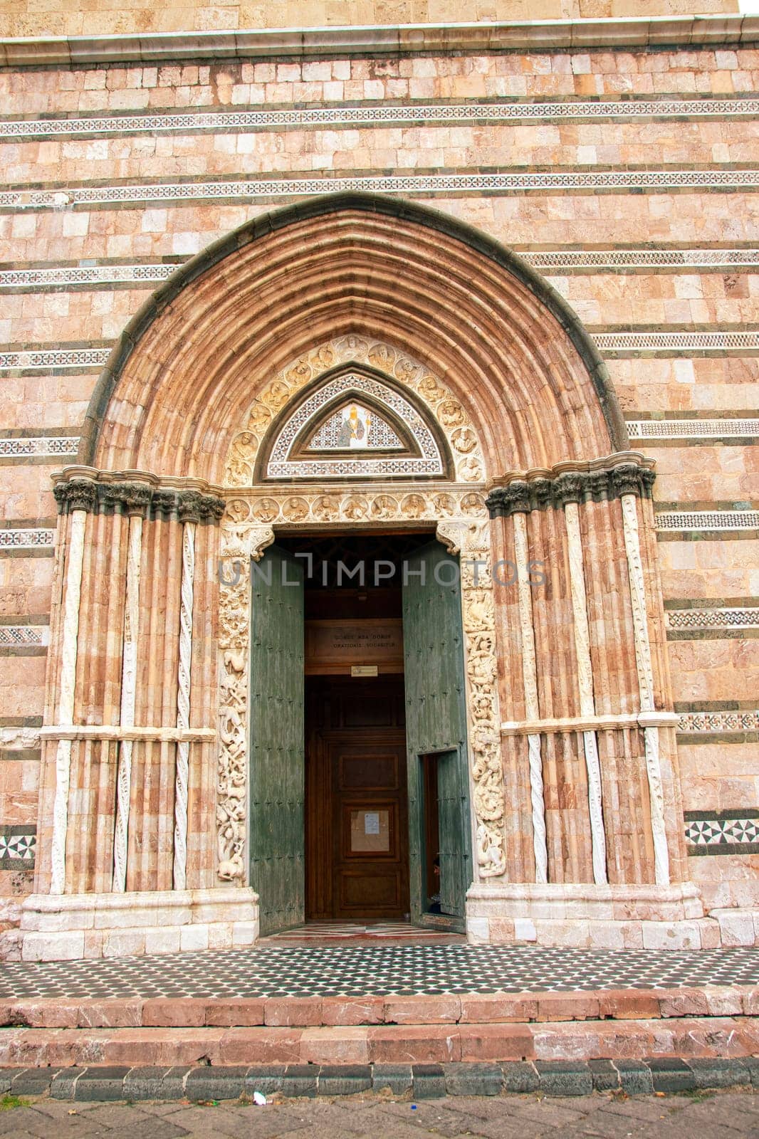 Sicily, Messina, Italy - 26 September 2023 – Messina Cathedral. Side entrance to Cathedral. The was consecrated in 1197 by Archbishop Berardo.
