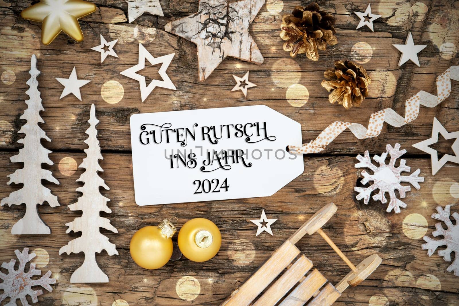Rustic Wooden Bokeh Christmas Background, Winter Decoration With Label With German Text Guten Rutsch Ins Jahr 2024, Which Means Happy New Year 2024 In English