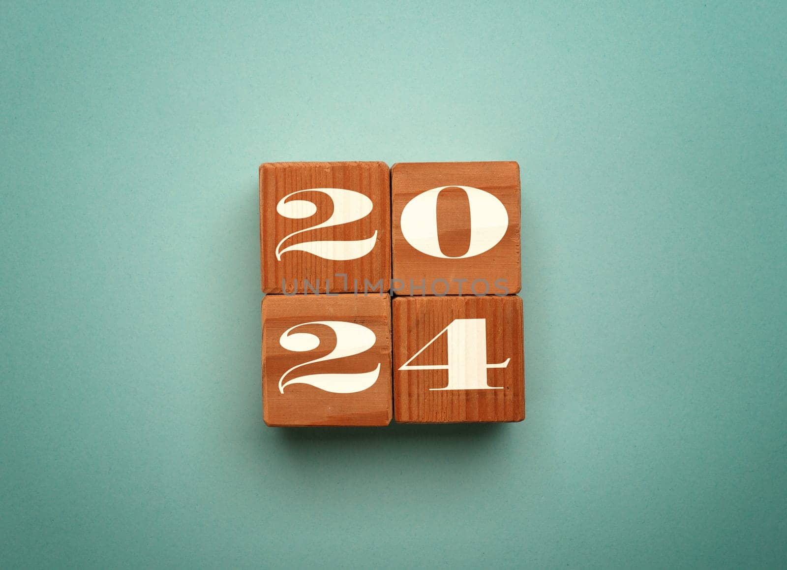 Wooden blocks with the Year number 2024, New Year concept, seasonal Christmas time
