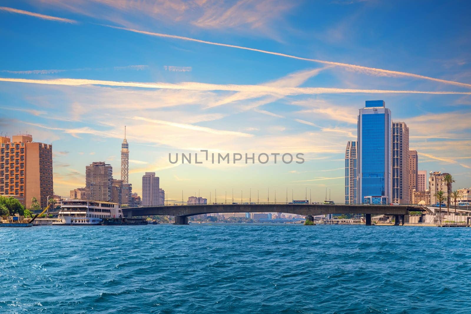 Nile river, bridge, tv tower and famous buildings of Cairo, Egypt.