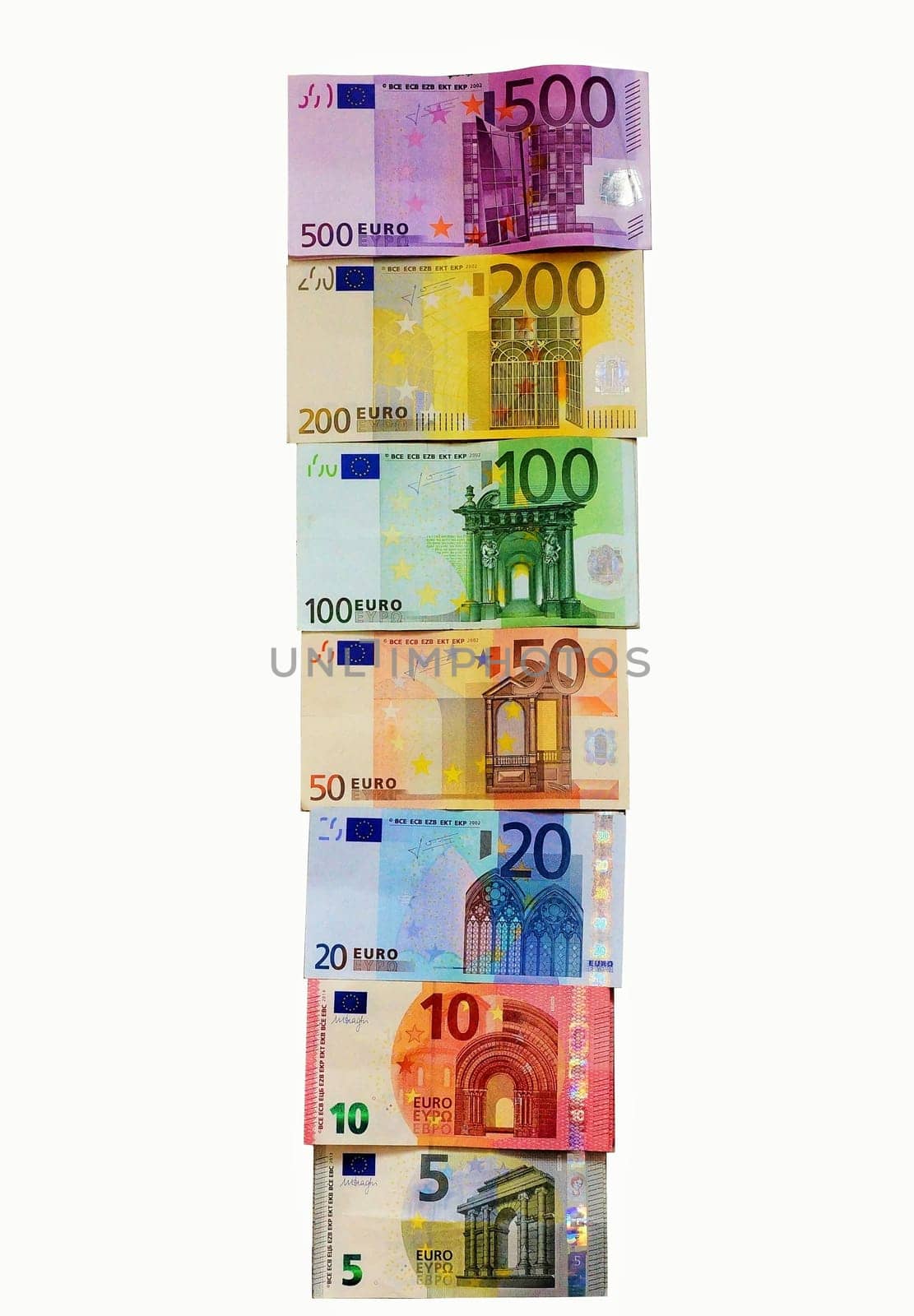 Different euro banknotes on a white background