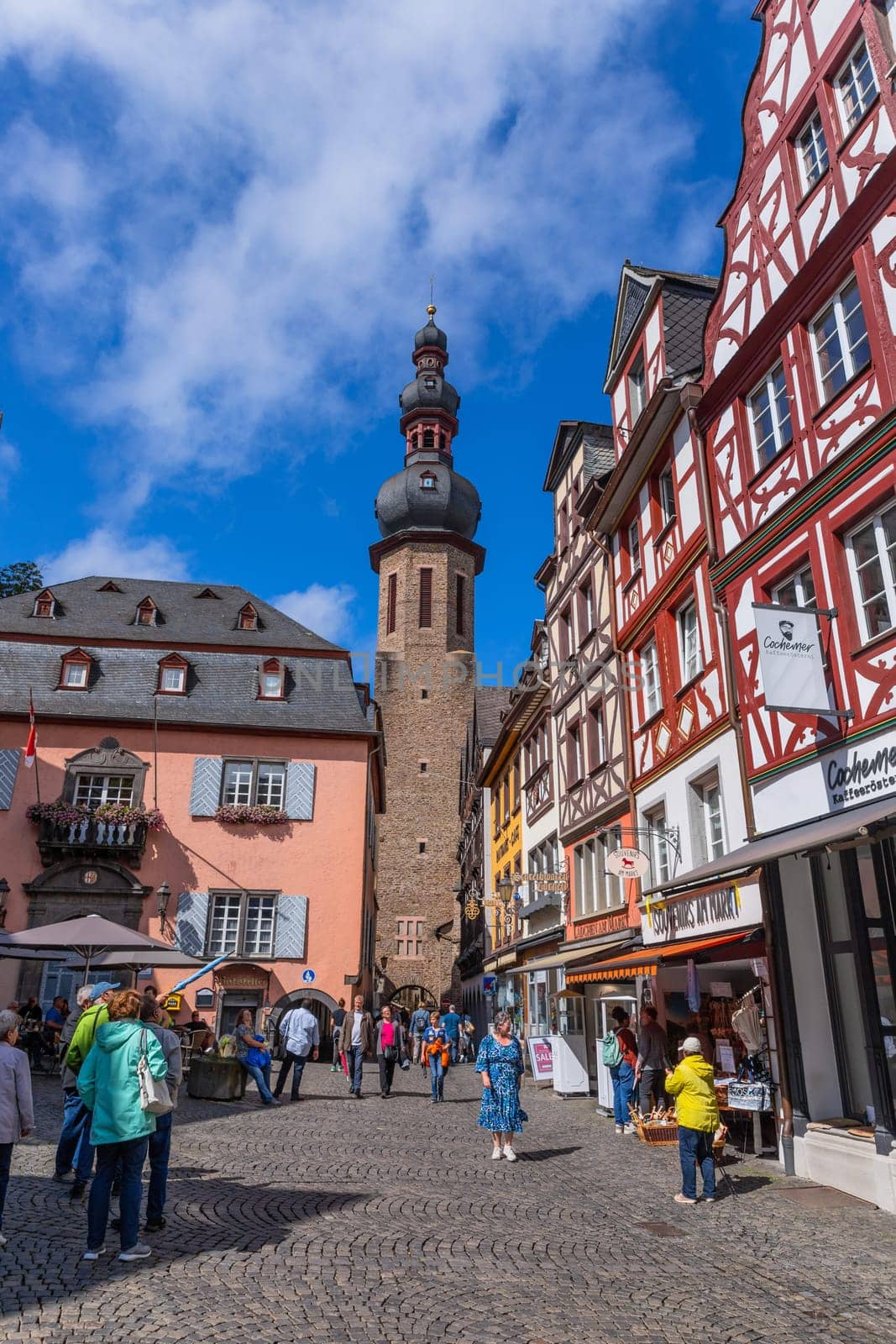 Cochem, Germany: 02 August 2023: People in the Market square in the city of Cochem, Germany