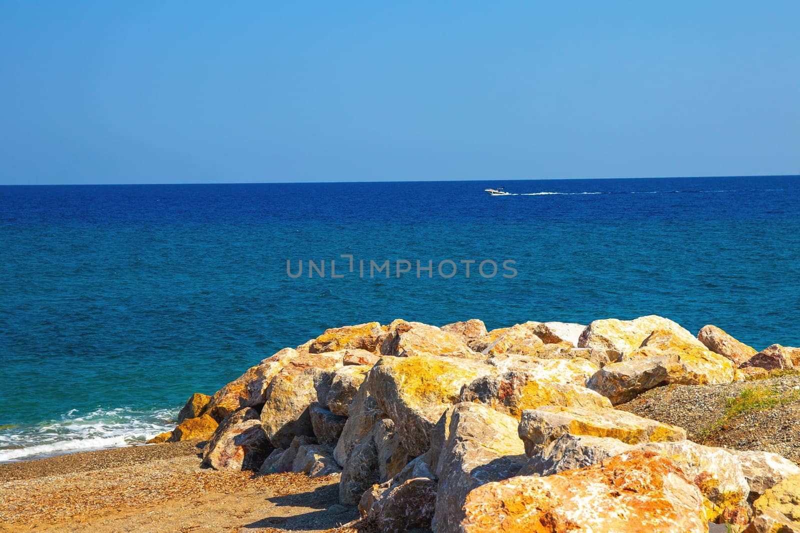 Milazzo, Messina, Sicily, Italy - 02 October 2023. Rocks on the coast of Tyrrhenian Sea.