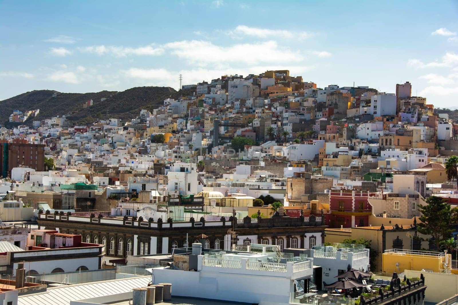 Panoramic top view of the capital Las Palmas Gran Canaria in Spain with blue sky