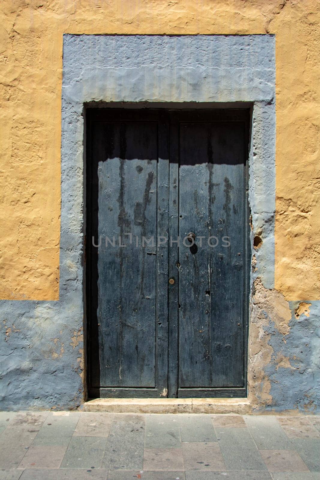 Old wooden door on a house on the Canary Island of Gran Canaria in Spain