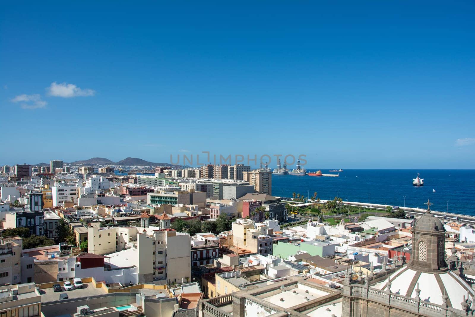 Panoramic view from above of the capital Las Palmas Gran Canaria in Spain with part of the Santa Ana Cathedral and views to the harbor and the sea