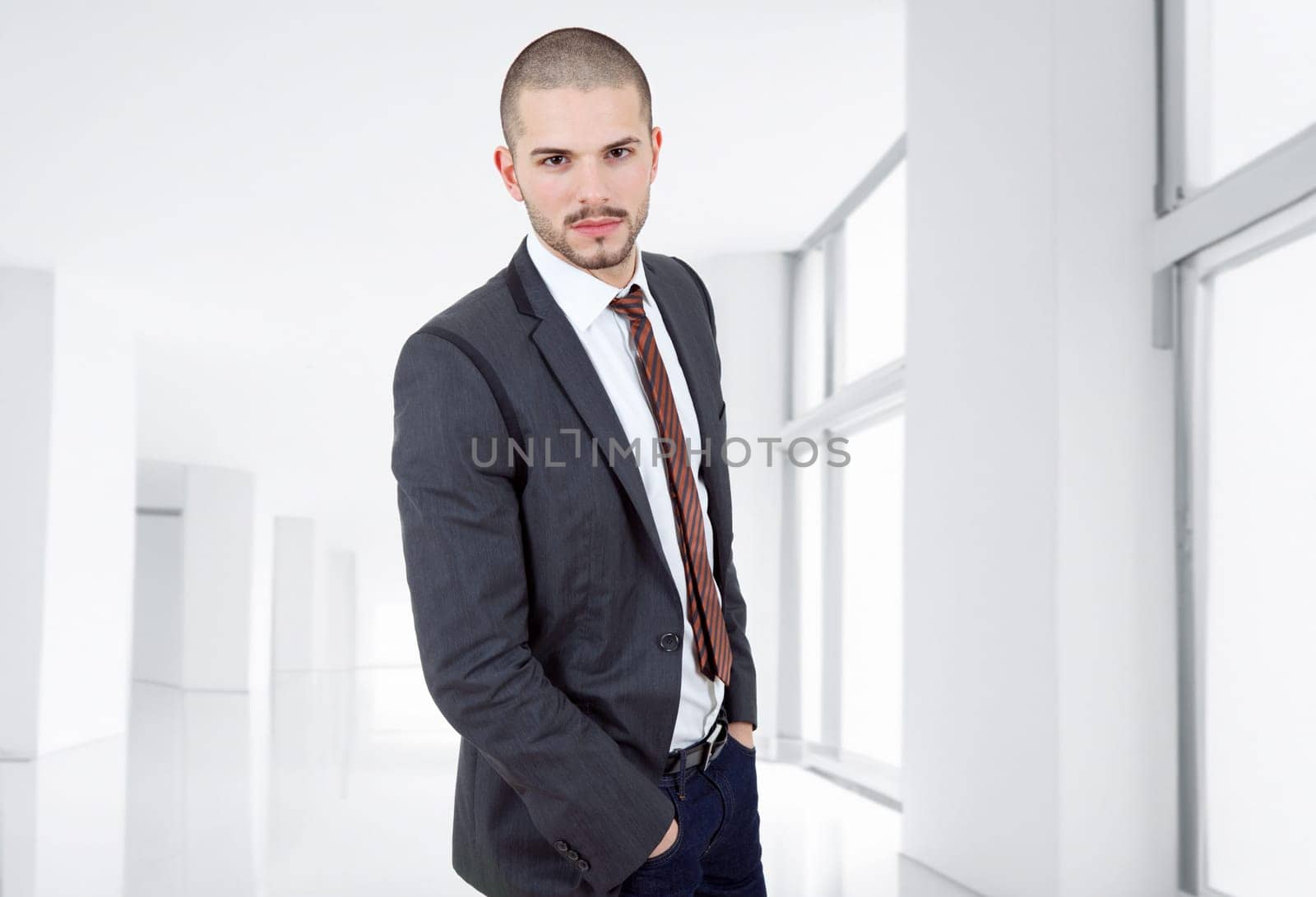 young business man portrait at the office