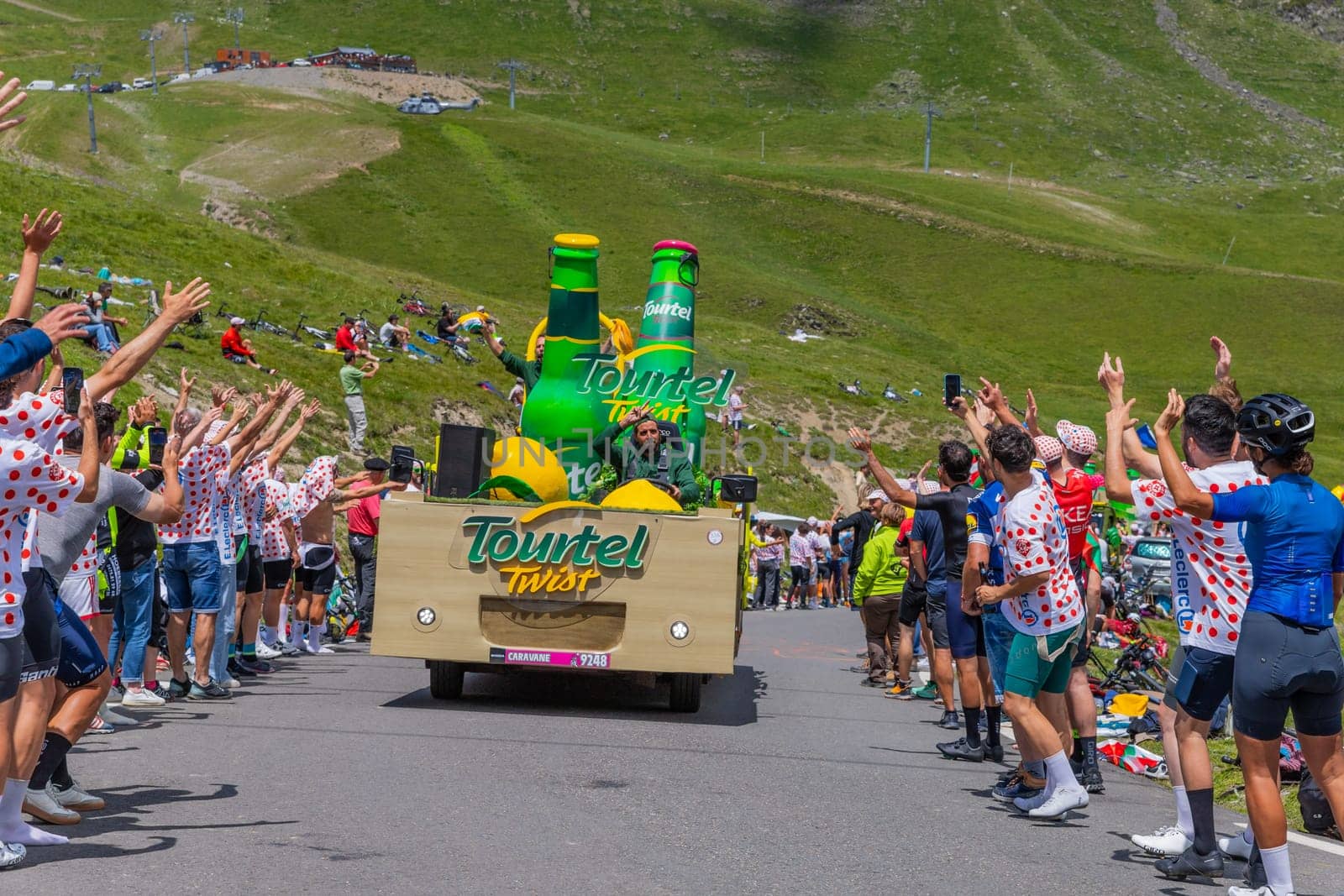 Col du Tourmalet, France - July 06 2023: Caravan car at the top of the Col du Tourmalet in Pyerenees mountains during the stage 6 of Le Tour de France 2023