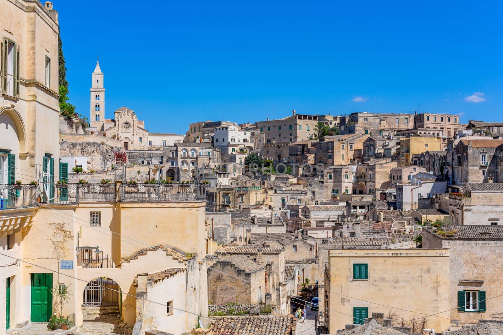 Matera, Italy - 6 May 2023: Ancient Unesco heritage old town of Matera (Sassi di Matera), Basilicata, southern Italy. Prehistoric cave dwellings