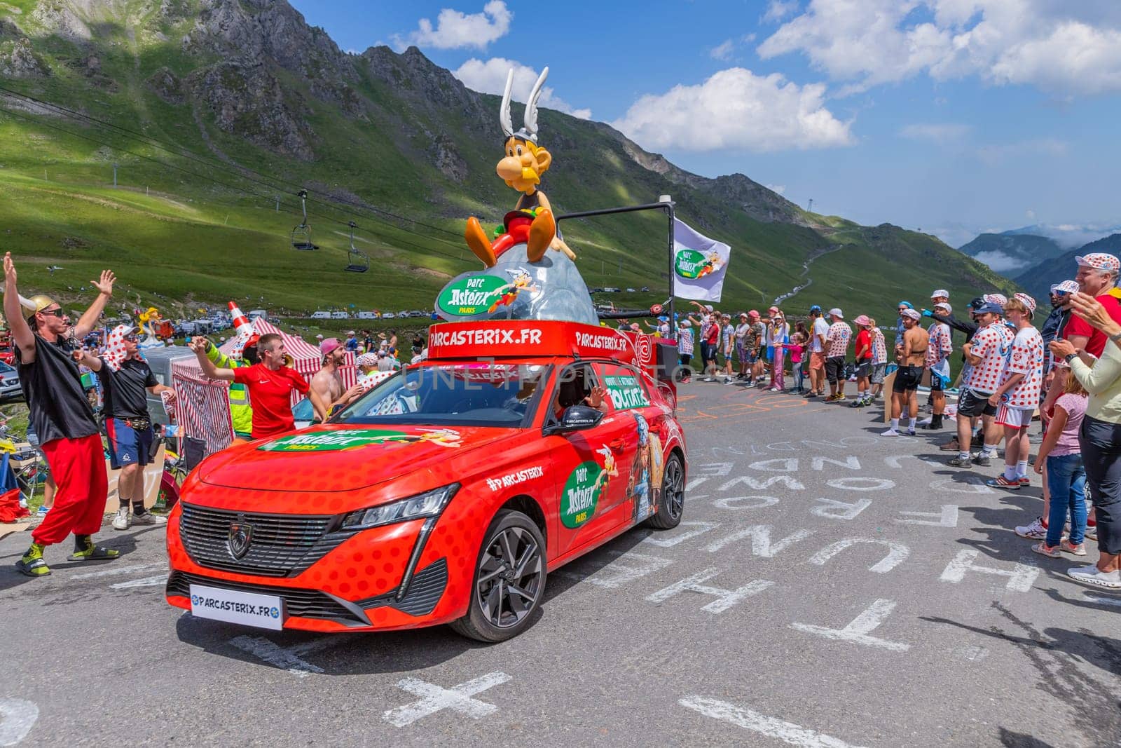 Col du Tourmalet, France - July 06 2023: Caravan car at the top of the Col du Tourmalet in Pyerenees mountains during the stage 6 of Le Tour de France 2023