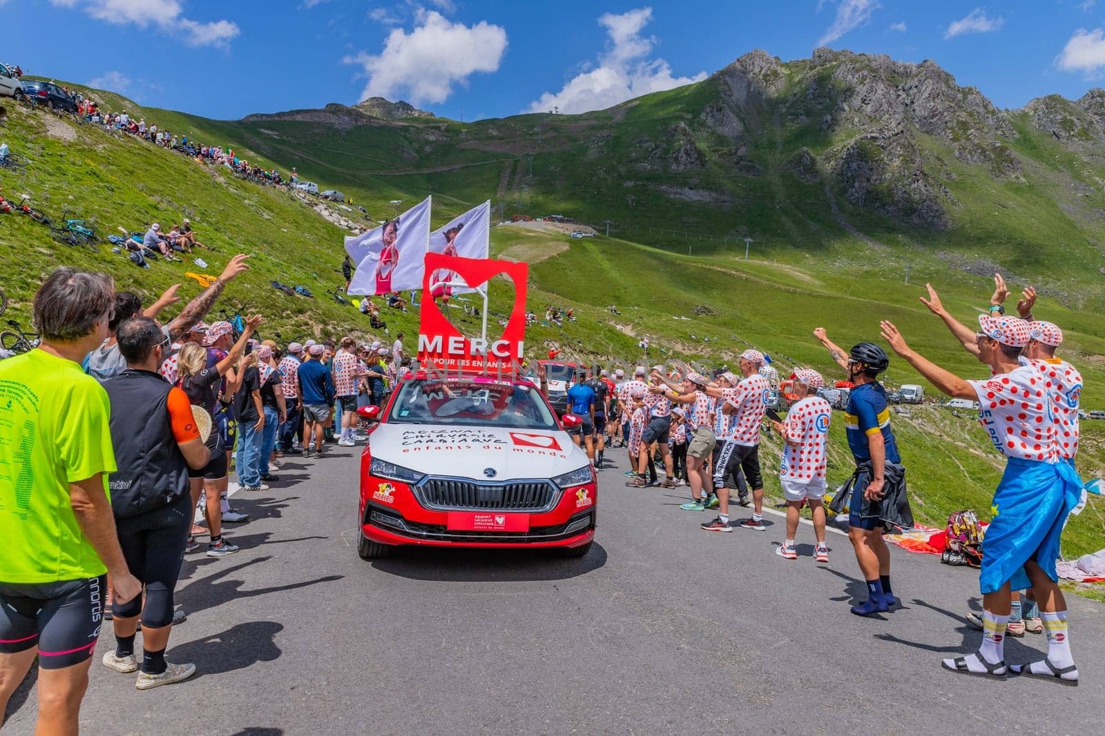 Col du Tourmalet, France - July 06 2023: Caravan car at the top of the Col du Tourmalet in Pyerenees mountains during the stage 6 of Le Tour de France 2023