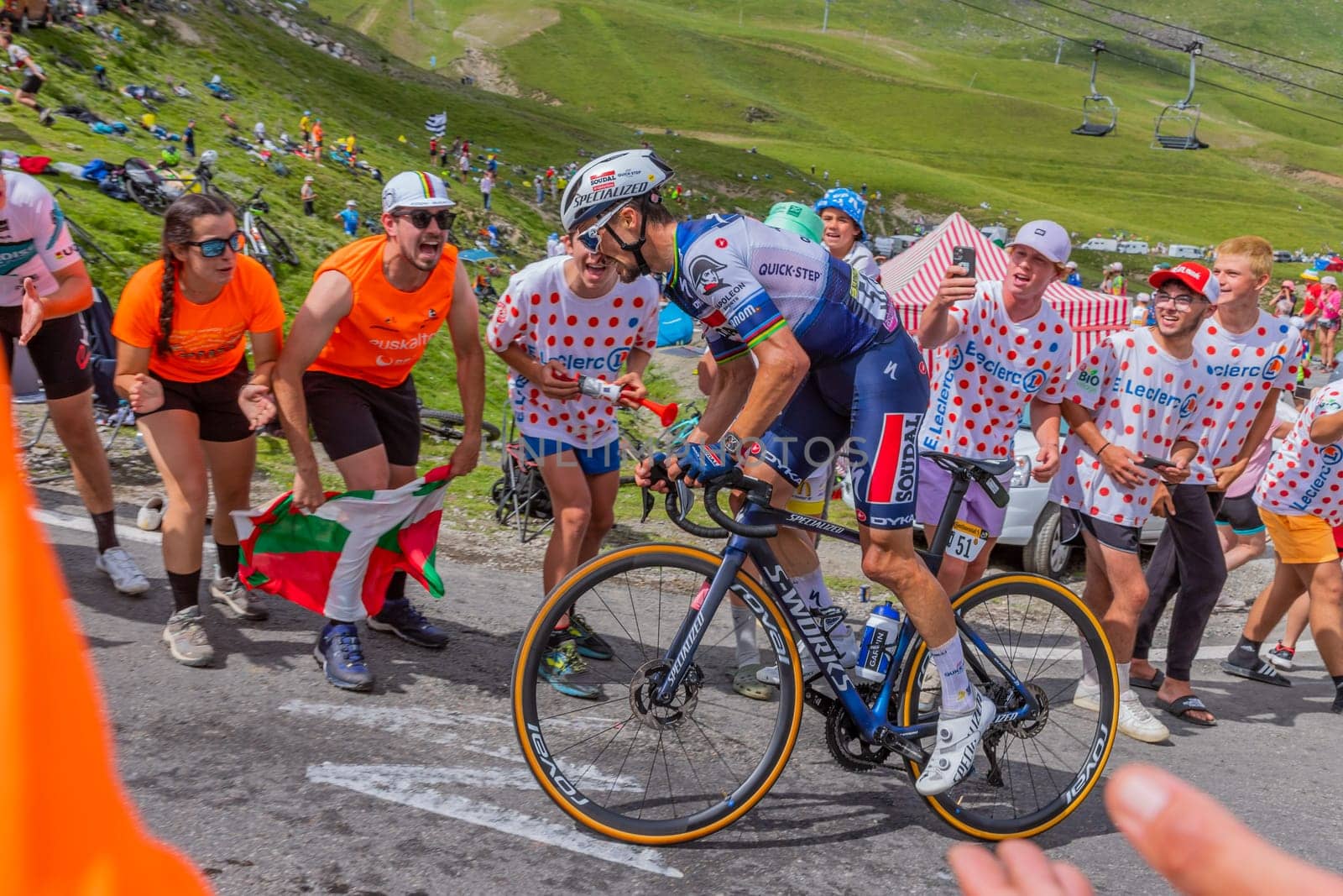 Col du Tourmalet, France - July 06 2023: Julian Alaphilippe climbig the road to Col du Tourmalet in Pyerenees mountains during the stage 6 of Le Tour de France 2023.