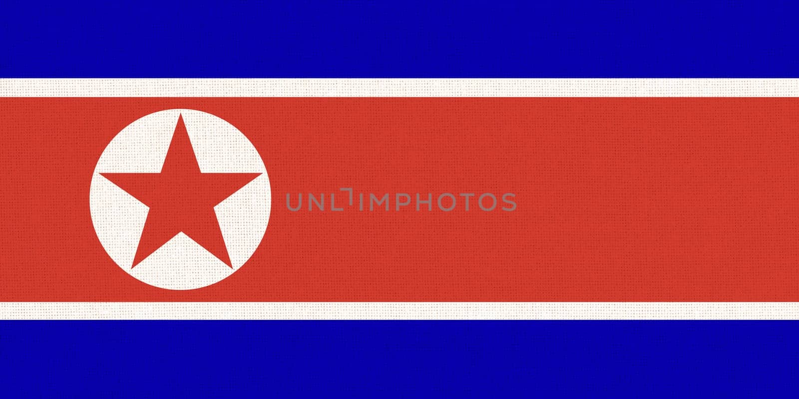 Flag of North Korea. North Korea state symbol. flag of Democratic People Republic of Korea on fabric surface. Fabric Texture. Korean state symbol. Asian country. State symbol of Northern Korea