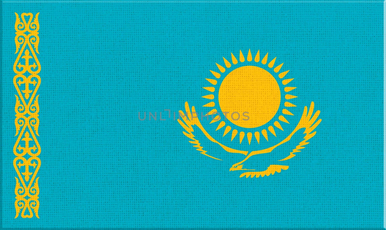 flag of Kazakhstan. National Kazakh flag on fabric surface. Kazakh national flag on textured background. Fabric Texture. Republic of Kazakhstan. Asian country. State symbol of Kazakhstan