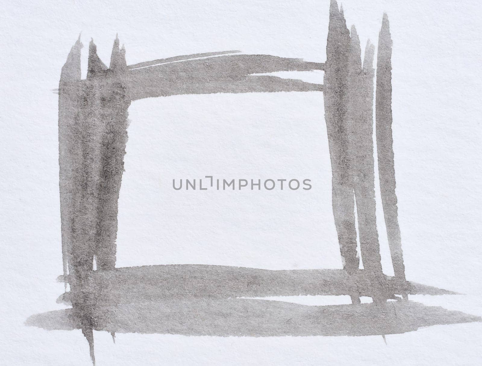 Watercolor brush stroke of black paint on a white  background