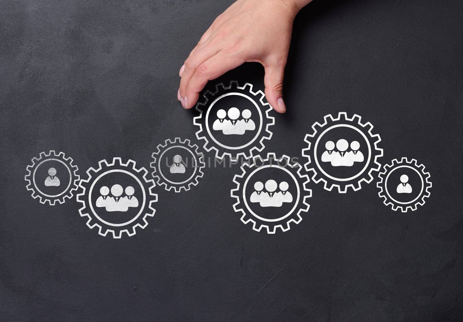 Hand and chalk drawn staff icons, human resource management concept, team performance improvement and leadership