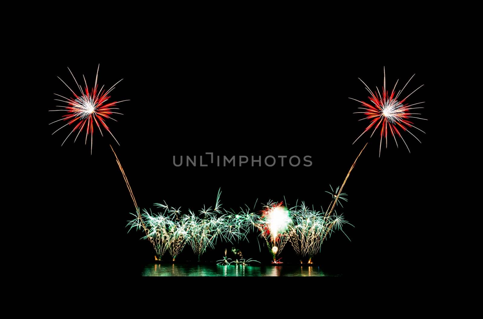 Beautiful fireworks display on black sky with copy space for greeting text. Celebration and anniversary concept