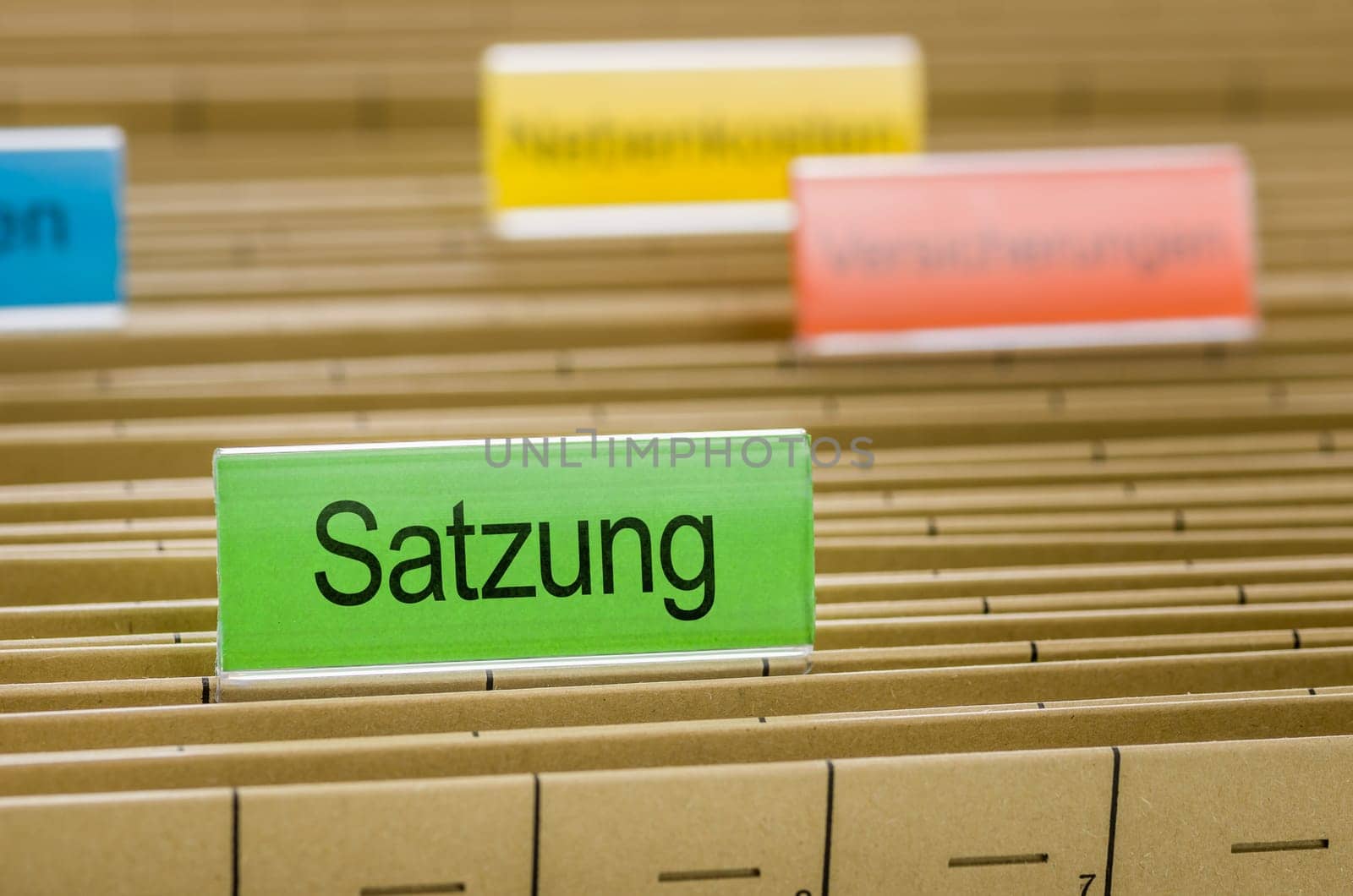 Hanging file folder labeled with Ordinance in german - Satzung