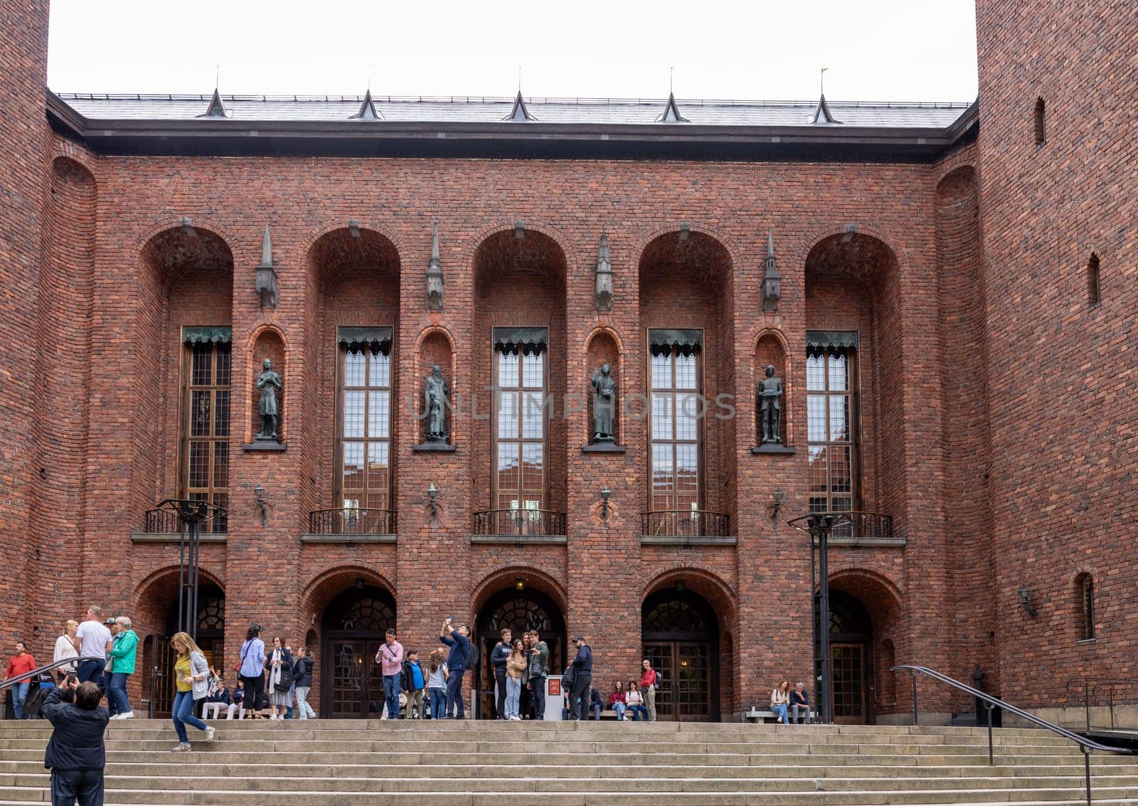 Stockholm, Sweden - July 25, 2023: Stockholm City Hall is the building of the Stockholm City Council in Sweden. It is located on Kungsholmen Island on the edge of Lake Mlar. Designed by architect Ragnar stberg