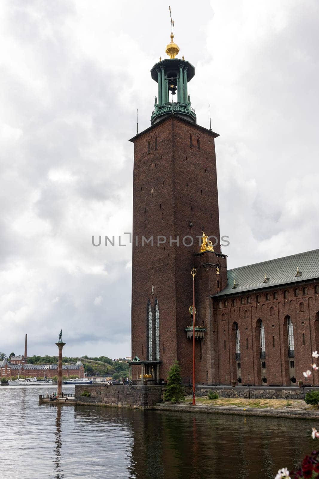 Stockholm, Sweden - July 25, 2023: Stockholm City Hall is the building of the Stockholm City Council in Sweden. It is located on Kungsholmen Island on the edge of Lake Mlar. Designed by architect Ragnar stberg