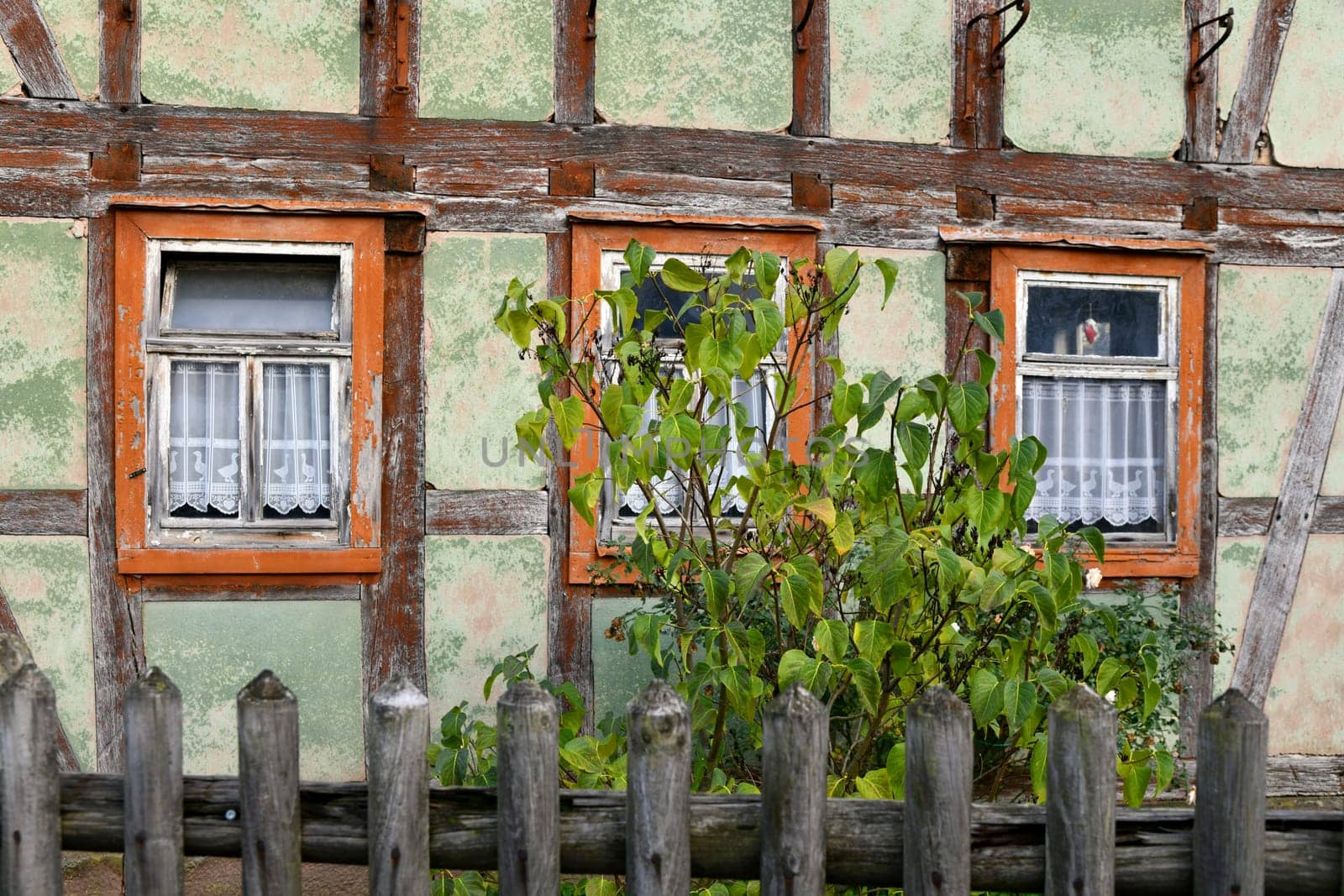 empty half-timbered house with panel curtains