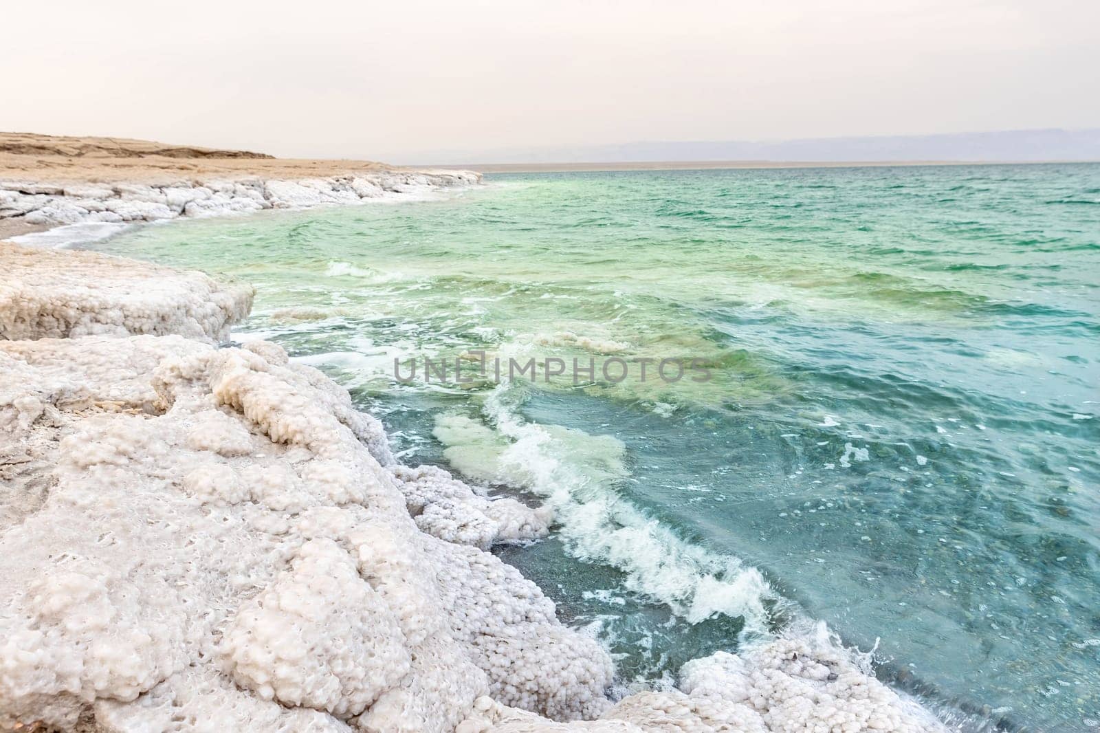 Deposits of mineral salts, typical landscape of the Dead Sea in Jordan. Horizontally.