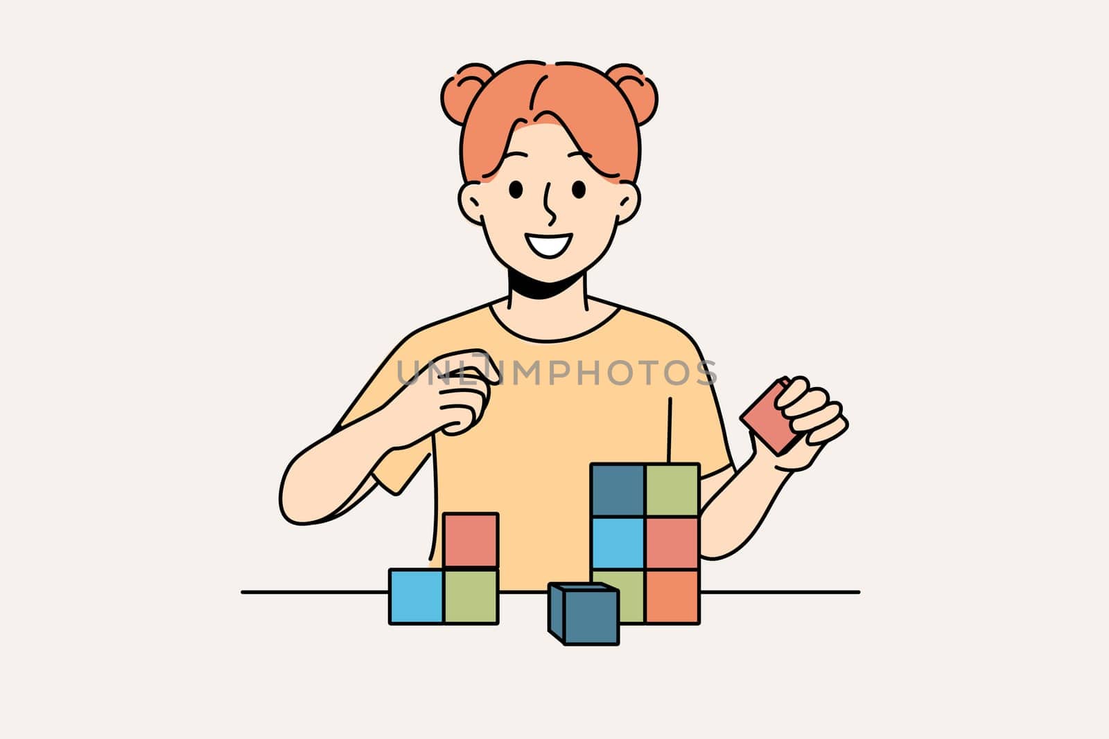 Happy little girl playing with wooden child cubes standing at table and smiling looking at screen. Child plays educational game that helps improve intellectual abilities and fine motor skills.