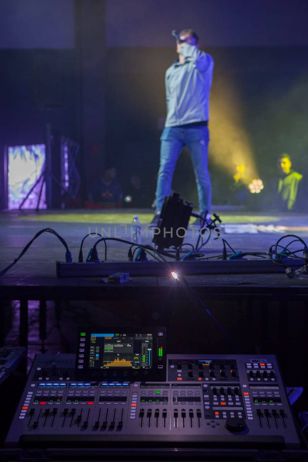 Merida, Spain - Dec 9th, 2022: Rap battling performance. Mixing console in focus
