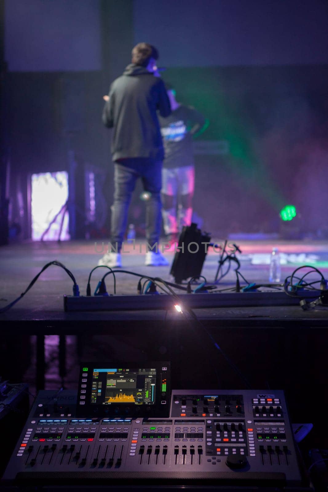 Merida, Spain - Dec 9th, 2022: Rap battling performance. Mixing console in focus