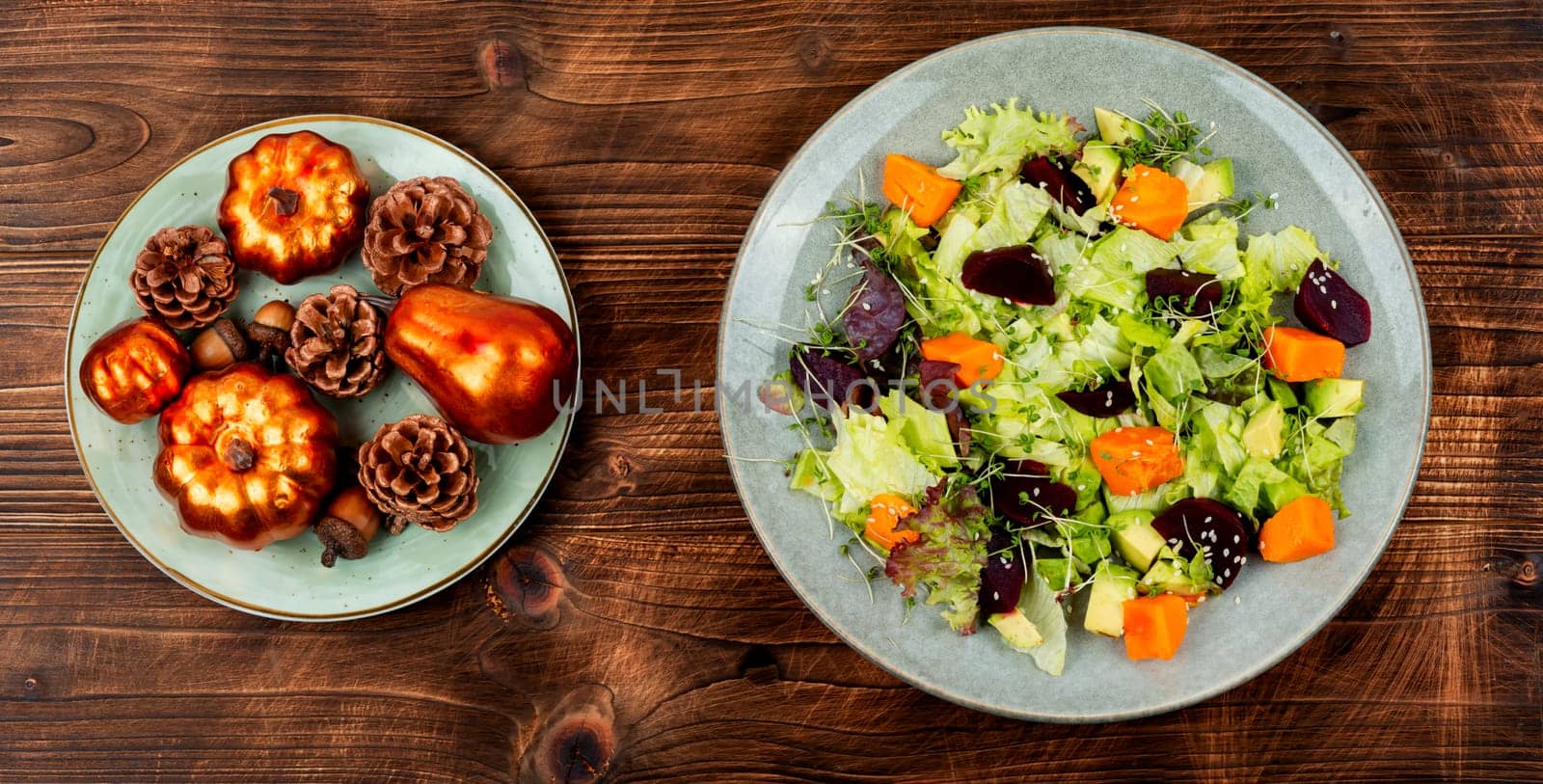 Autumn healthy squash salad with beetroot and lettuce. Autumn food concept. Top view. Rustic style.