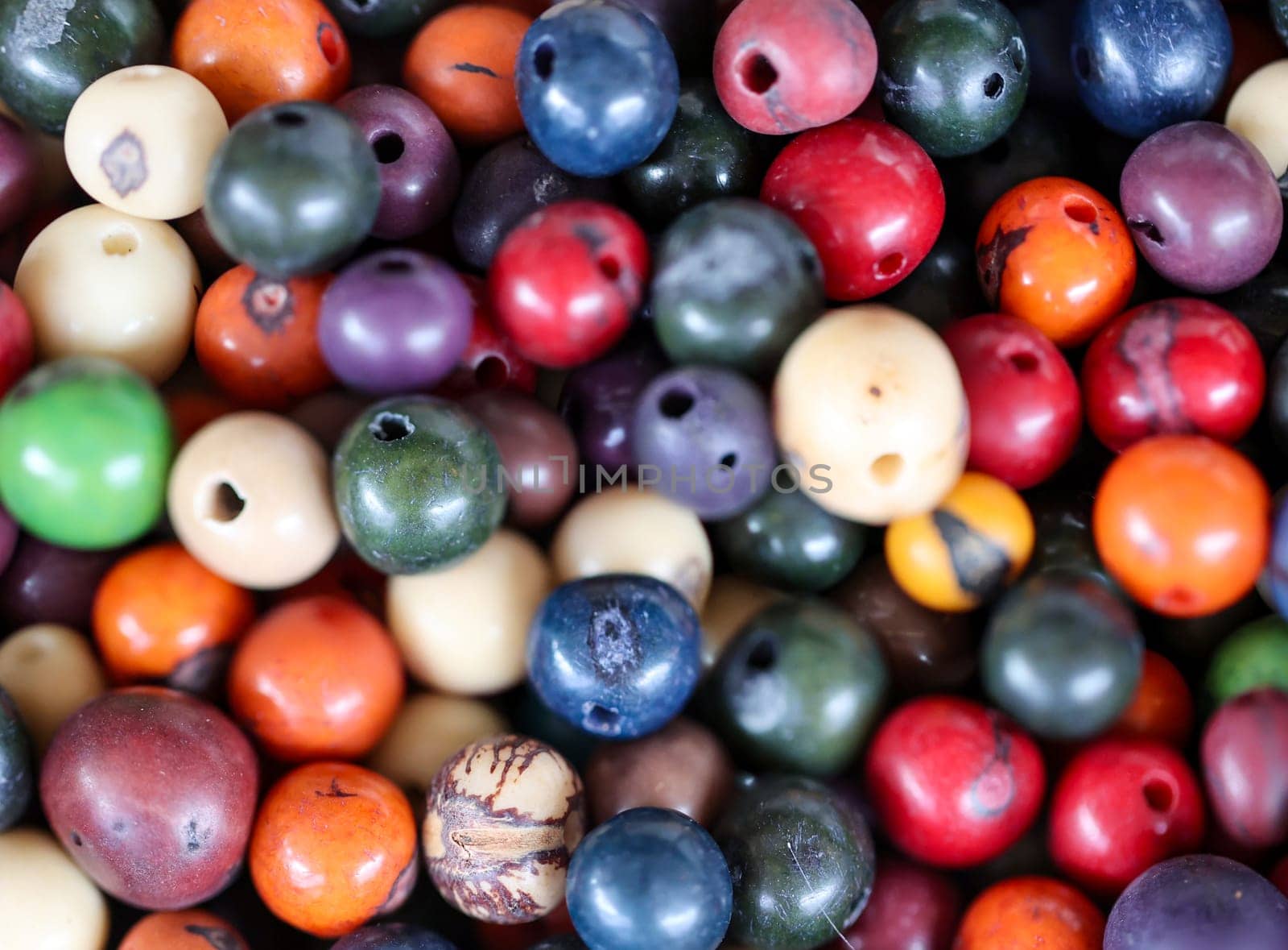 Lots of jewellery beads, beads for a bead necklace in a wooden box.