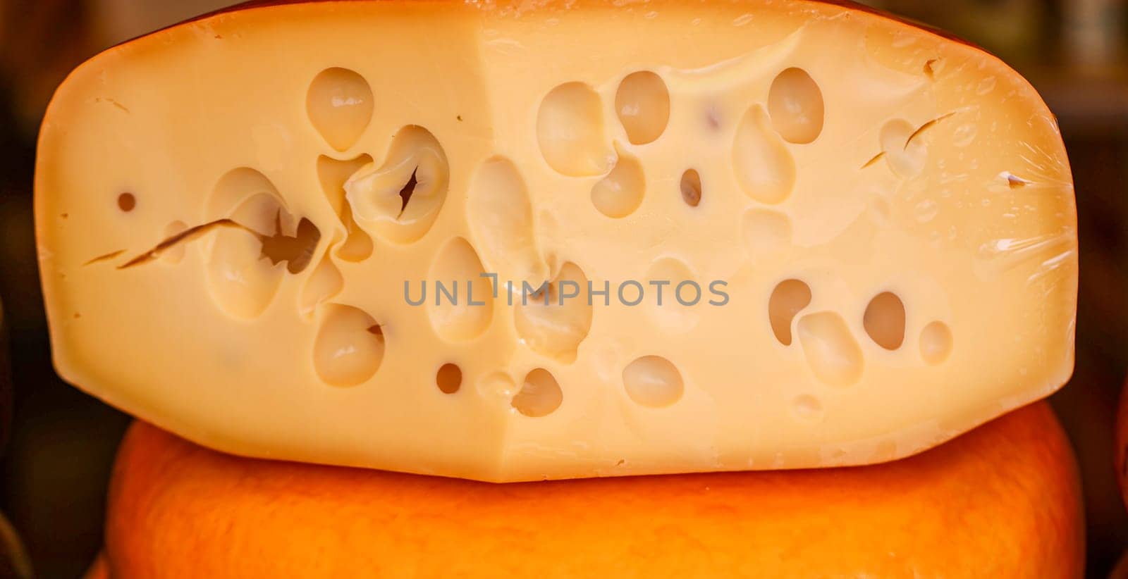 Delicious-looking cheeses in a pile.