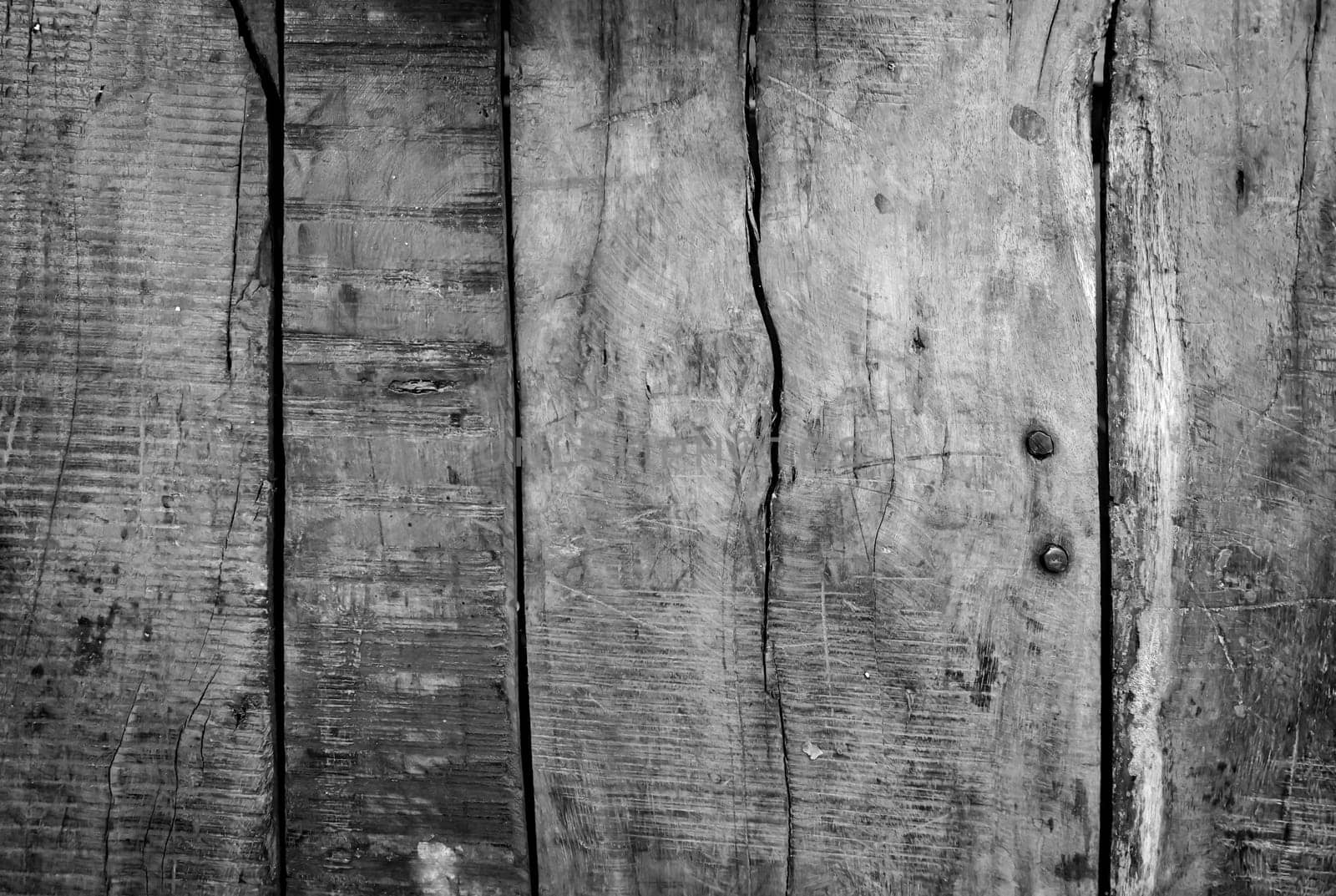 Wooden boards lying next to each other. A wooden texture made from several wooden boards.