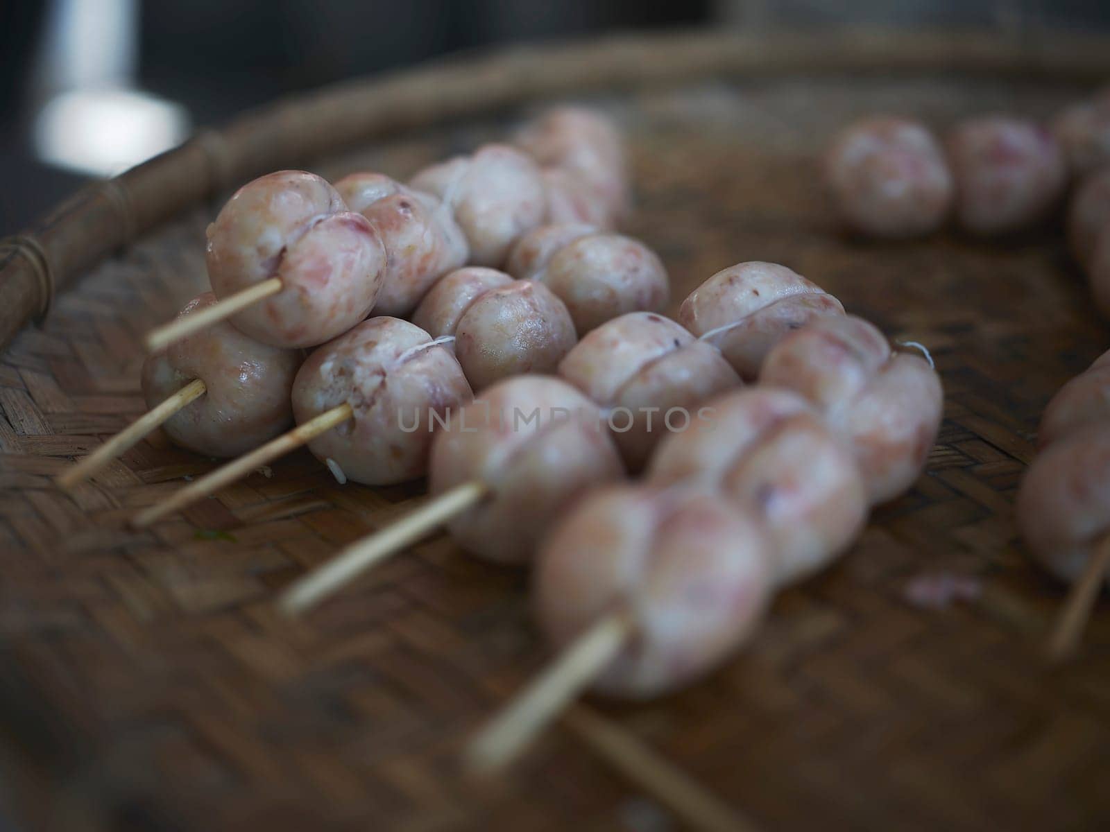 THAI ISAAN SAUSAGE. E-sarn sausages, Homemade sour sausages . Raw homemade pork meat sausages in skins with herbsand spices.