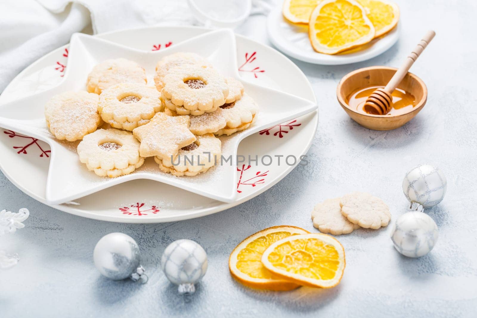 Homemade Christmas cookies with orange and honey.  Christmas decoration with ornaments.
