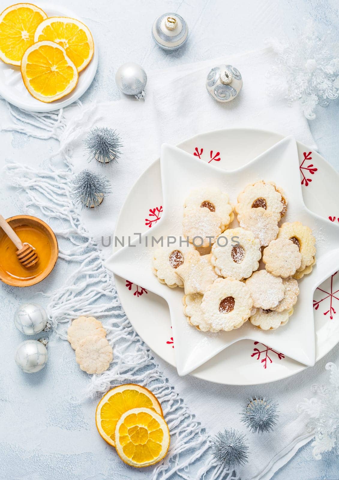 Homemade Christmas cookies with orange and honey.  Christmas decoration with ornaments.