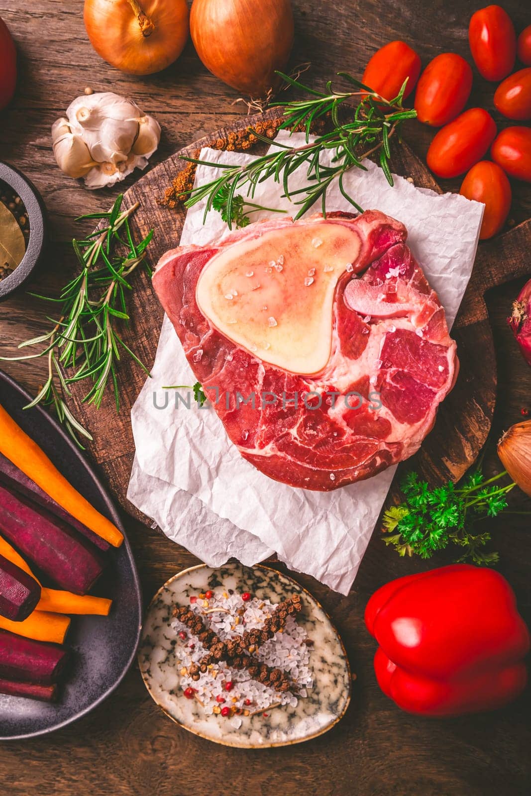 Raw beef meat shank steak, with  ingredients for preparation of ossobuco