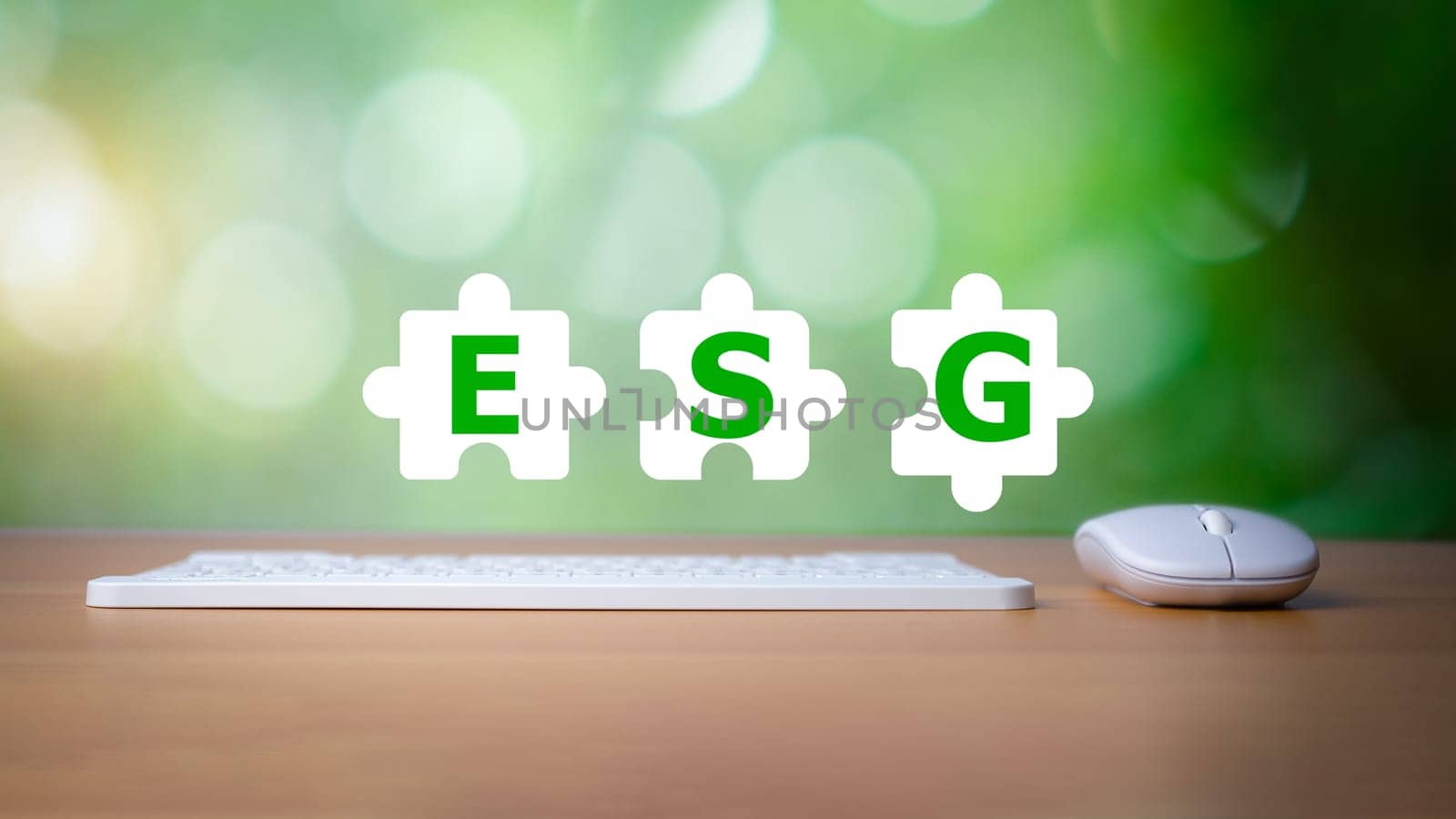 Keyboard and mouse placed on a wooden background with letters printed on a white Jigsaw icon representing ESG concepts for environmental, social and governance, business environmentally responsible.