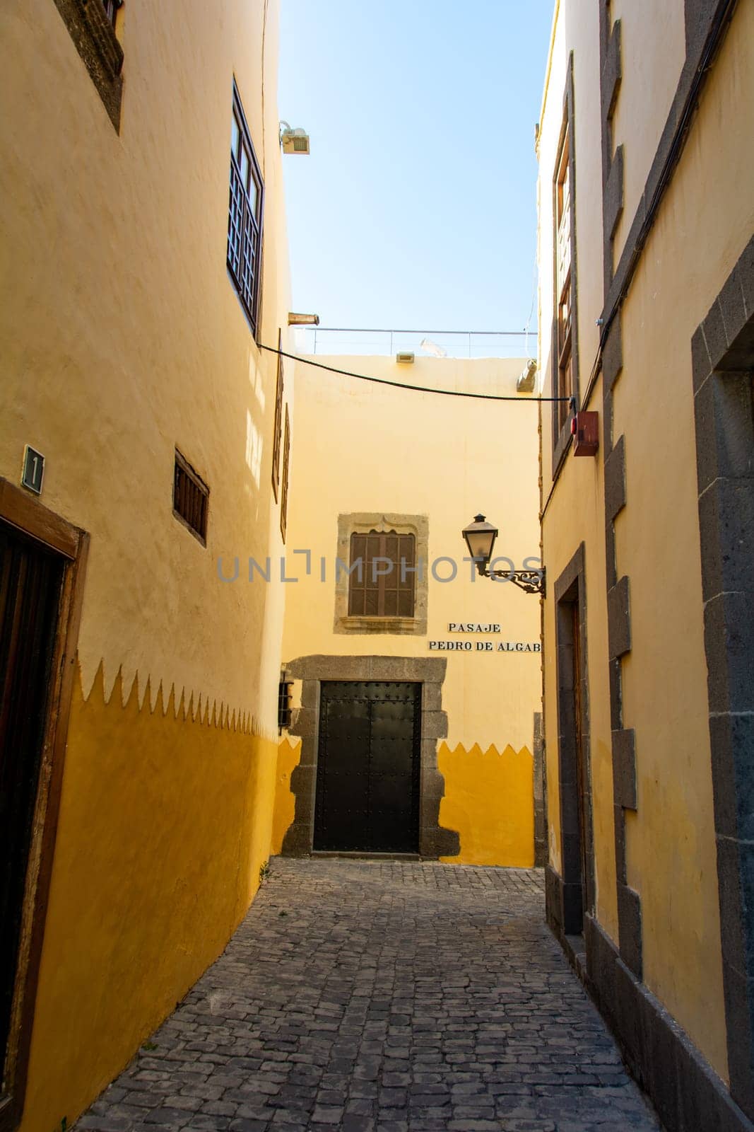 Narrow street with old houses in the historic old town of Las Palmas on the Canary Island of Gran Canaria, Spain, Europe