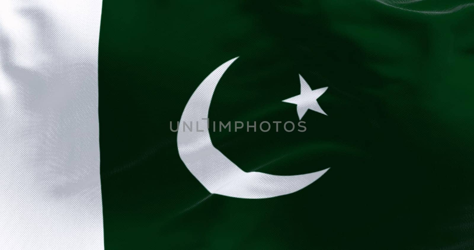 Close-up of Pakistan National flag waving. Green with white band on hoist  white crescent moon and five-pointed star. 3d illustration render. Rippling fabric. Textured background