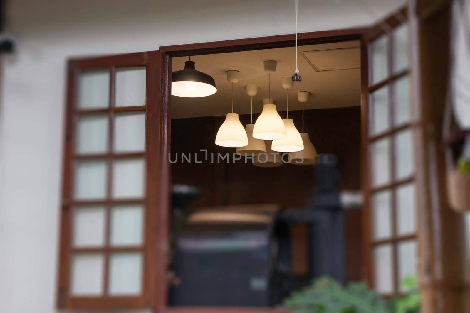Interior of cozy coffee shop atmosphere, stock photo
