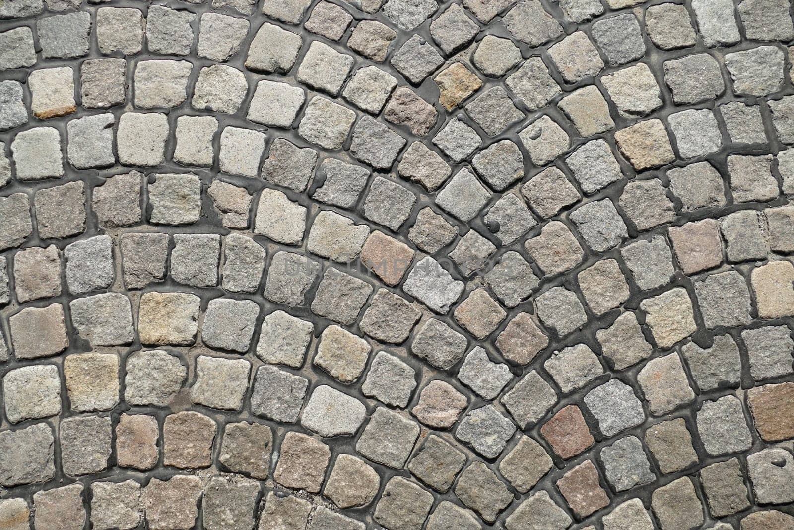 Gray cobblestone with curves, paving stones, Germany, Europe