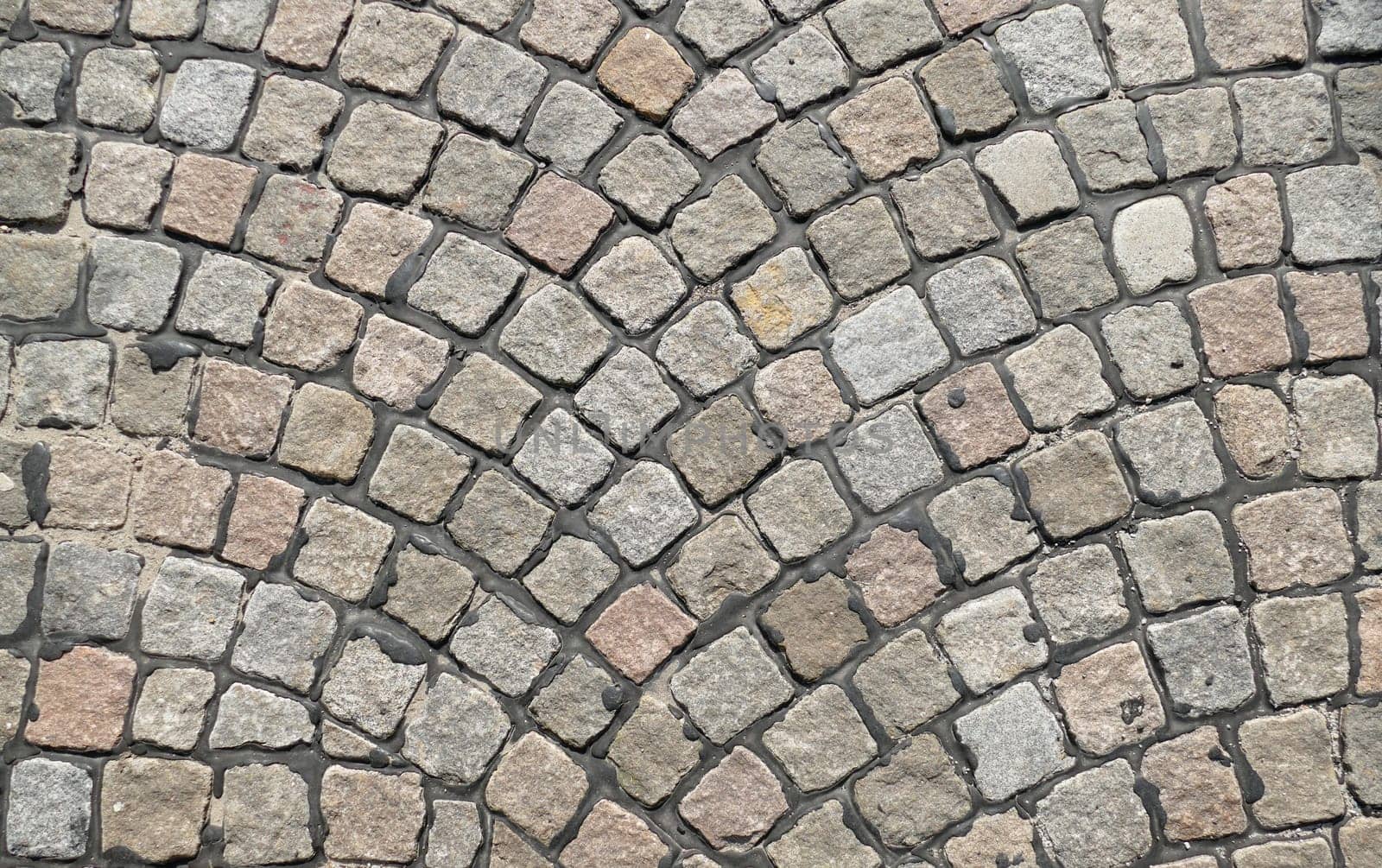 Gray cobblestone with curves, paving stones, Germany, Europe