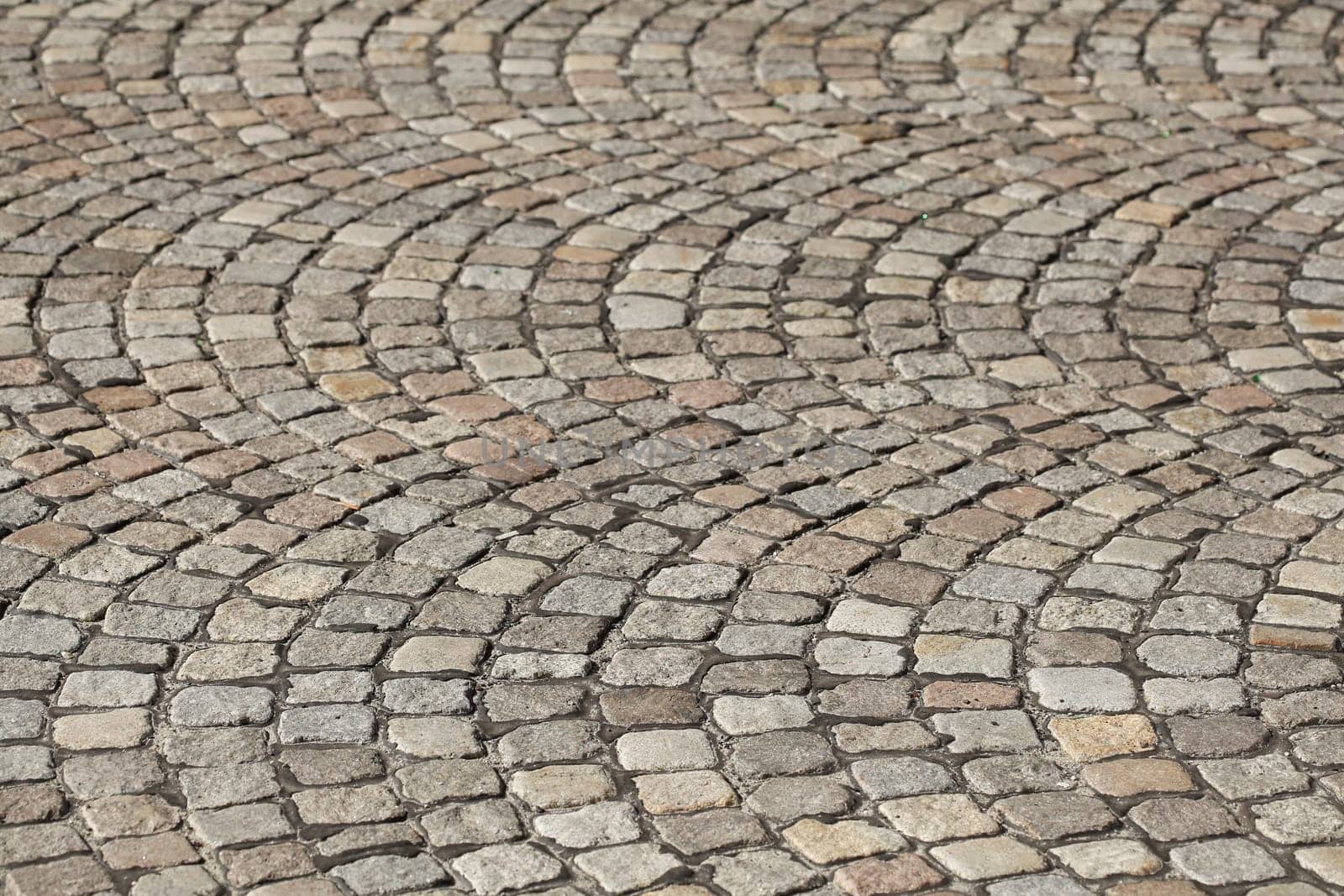 Gray cobblestone with curves, paving stones, Germany, Europe