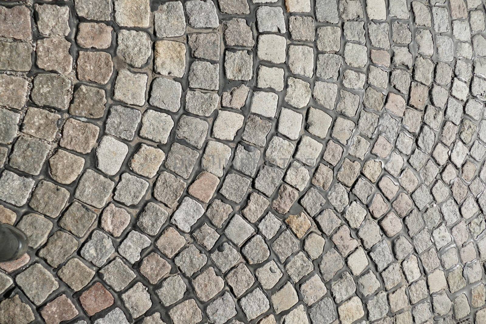 Gray cobblestone with curves, paving stones, Germany, Europe