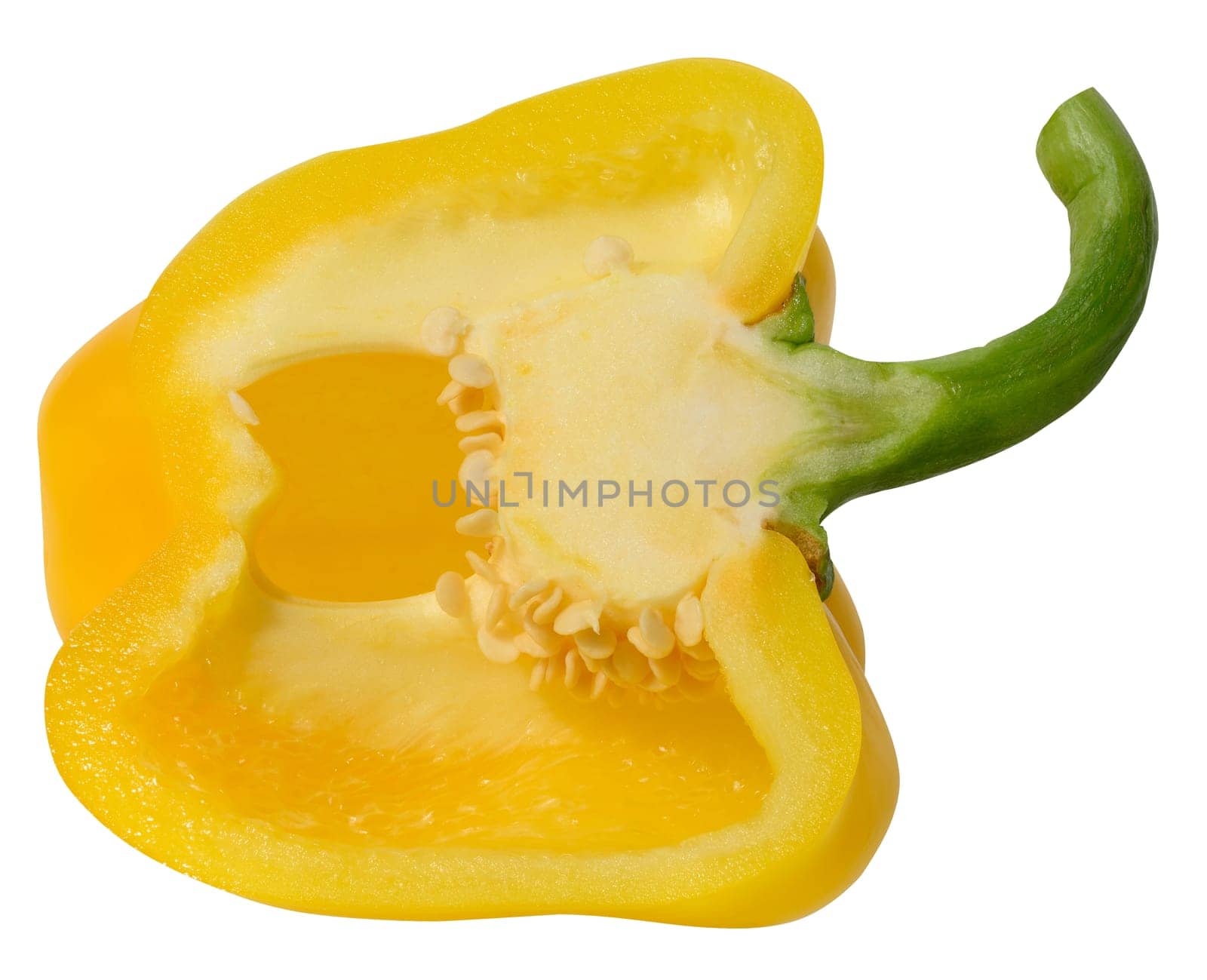 Half of yellow pepper with seeds on white isolated background