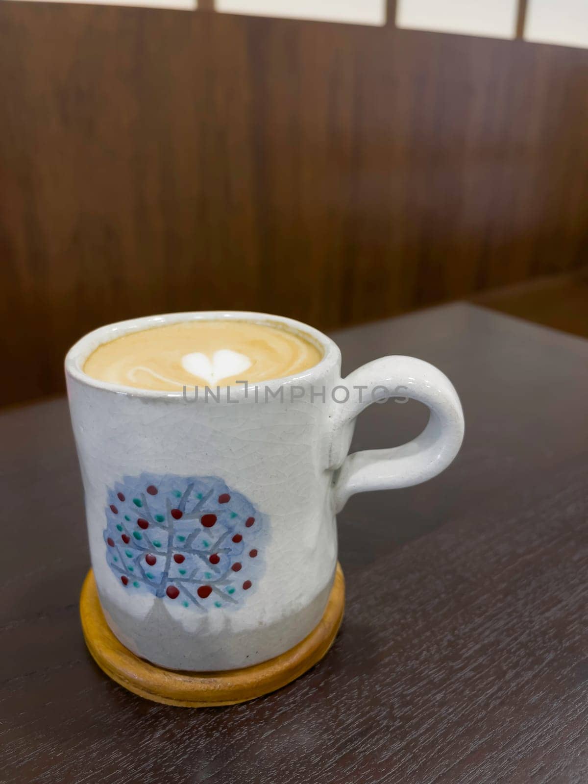 Hot coffee latte with mini heart art , stock photo