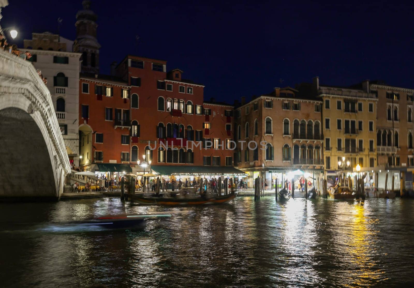 Venice, Italy - September 4, 2022: The Grand Canal near the Rialto Bridge at night